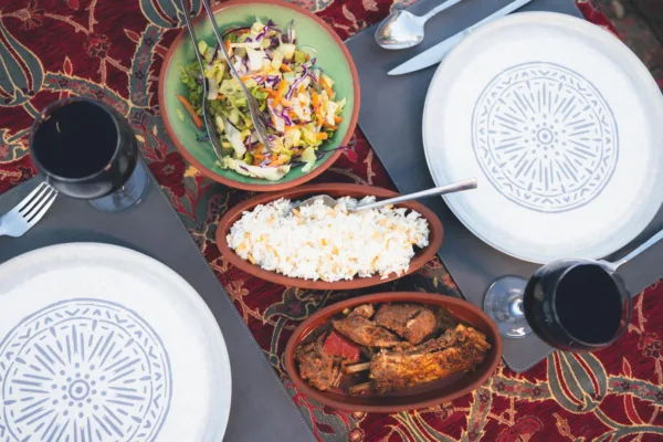 Cooking-Class---meal-with-slowcooked-pottery-meat-rice-salad-and-glasses-of-wine